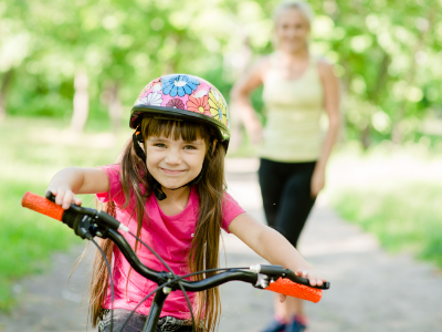 Young Girl Riding Bike